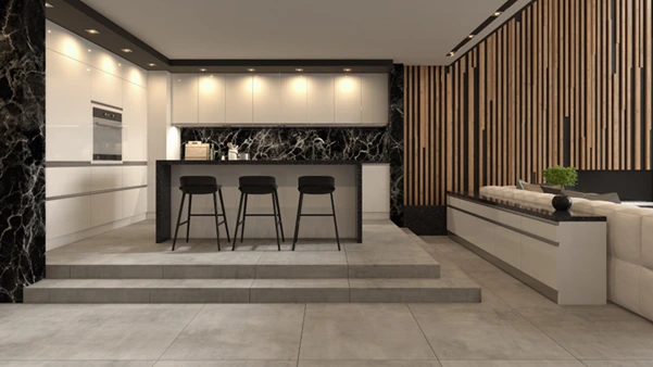 A luxurious modern kitchen with large format light grey tiles flooring